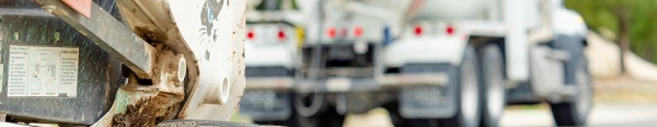 Picture of cement truck performing construction