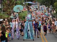 Picture of people at a festival on Main Street