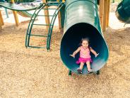 A child plays at Pace Park Playground
